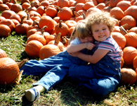 4 1/2 years old, hugging her best friend